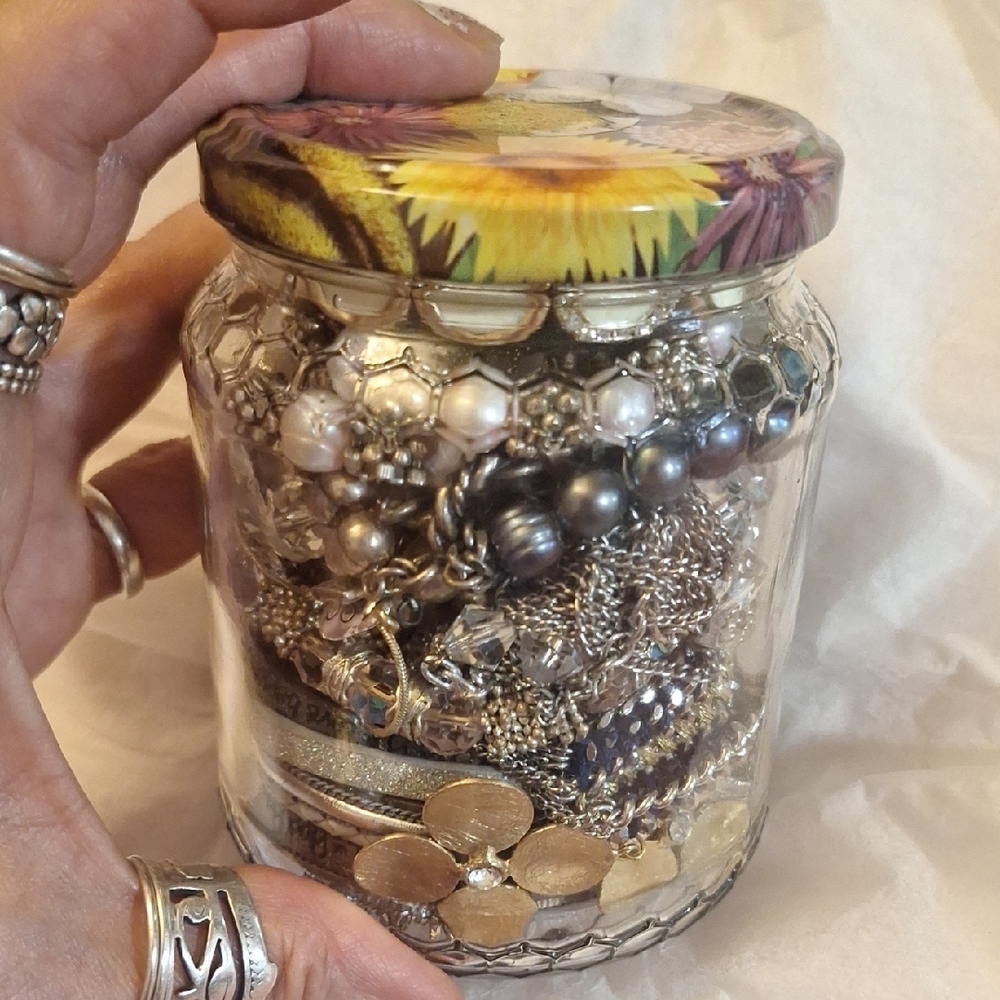Jar of Silver and Gold Jewelry